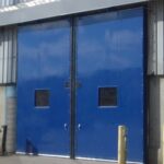 Bi-Part Slide Dominator Door, Exterior Mount, 24in/sec operation - Chrysler Truck Plant