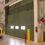 Vertical Lift Steel 3-Leaf automotive plant grade door, interior view