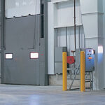 Vertical Lift 2-Leaf Doors with Floor Mounted Operator and Combination Control Panels