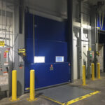 Vertical Lift Dominator 3-Leaf Dock Doors with Combination Integrated Dock Control Systems