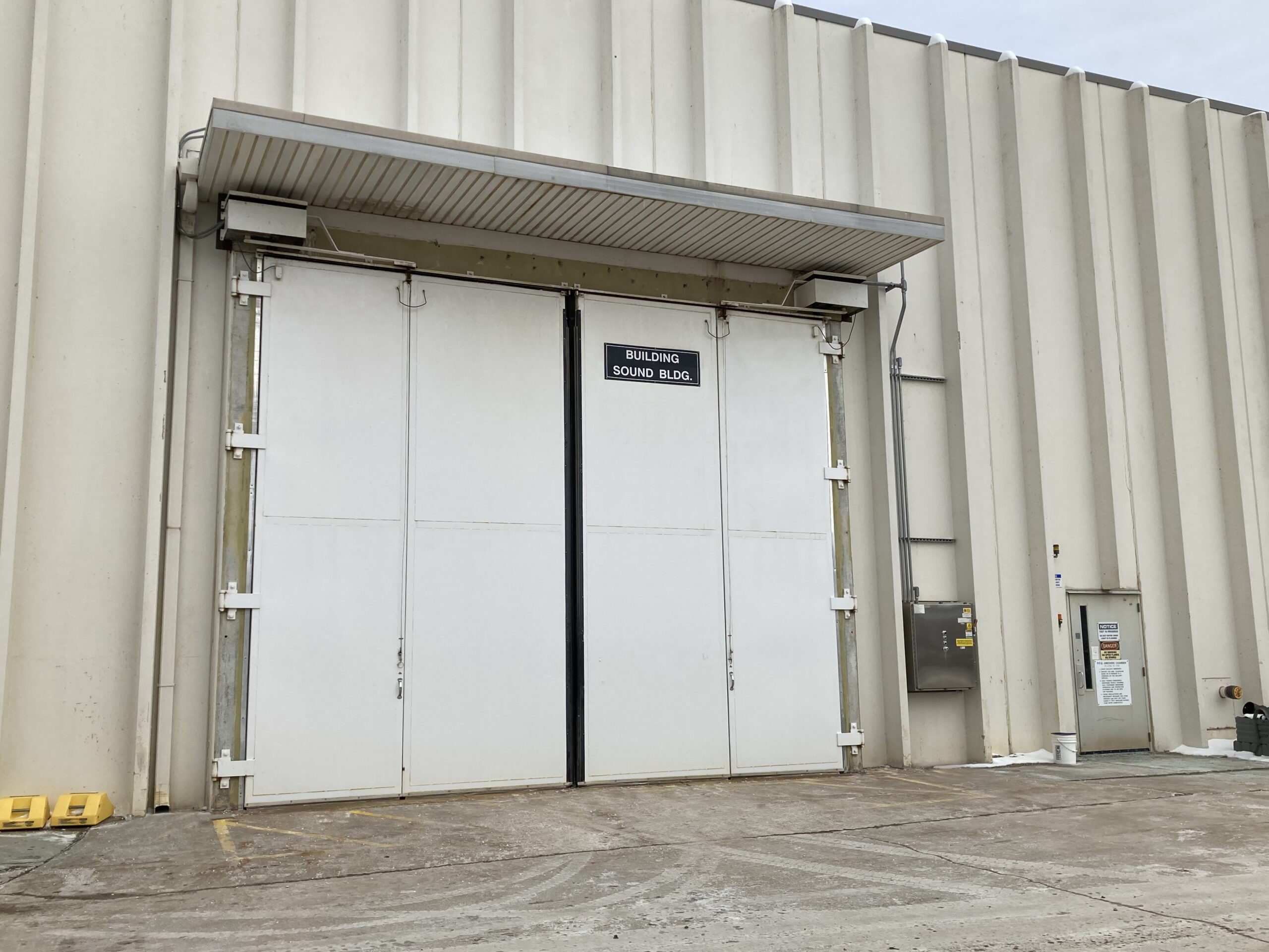 Four Fold Exterior Mounted Door, STC51 - heavy machinery testing cell