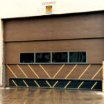 Vertical Lift Fabric Covered 3-Leaf 24' x 16' Door with 20' Bottom Swinging Impact Panel