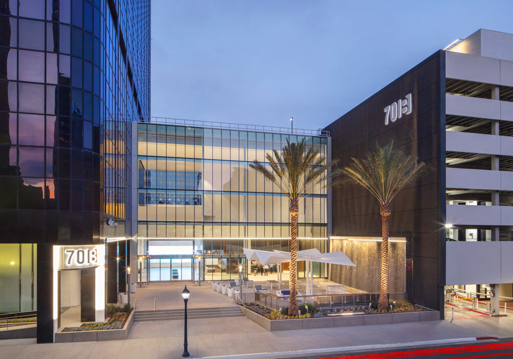 Sliding Glass Architectural Door separating Lobby environment to external patio in downtown San Diego