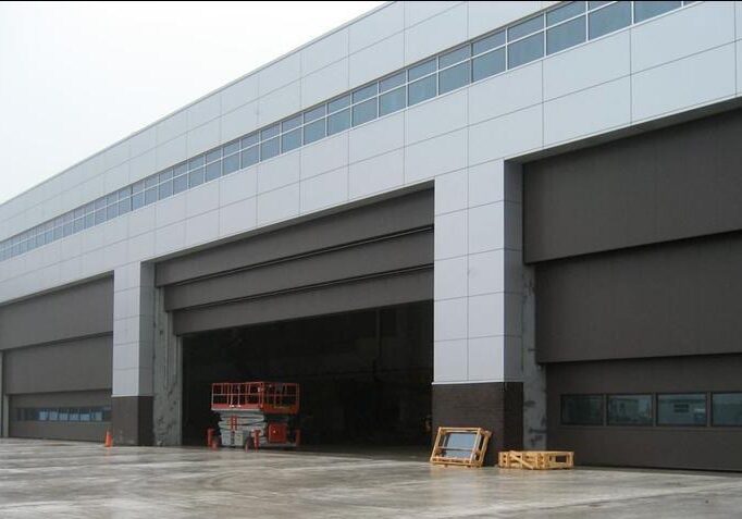 Vertical Lift Steel 3-Leaf multiple Doors 80' x 28' for High Wind Load and Post Disaster Operation
